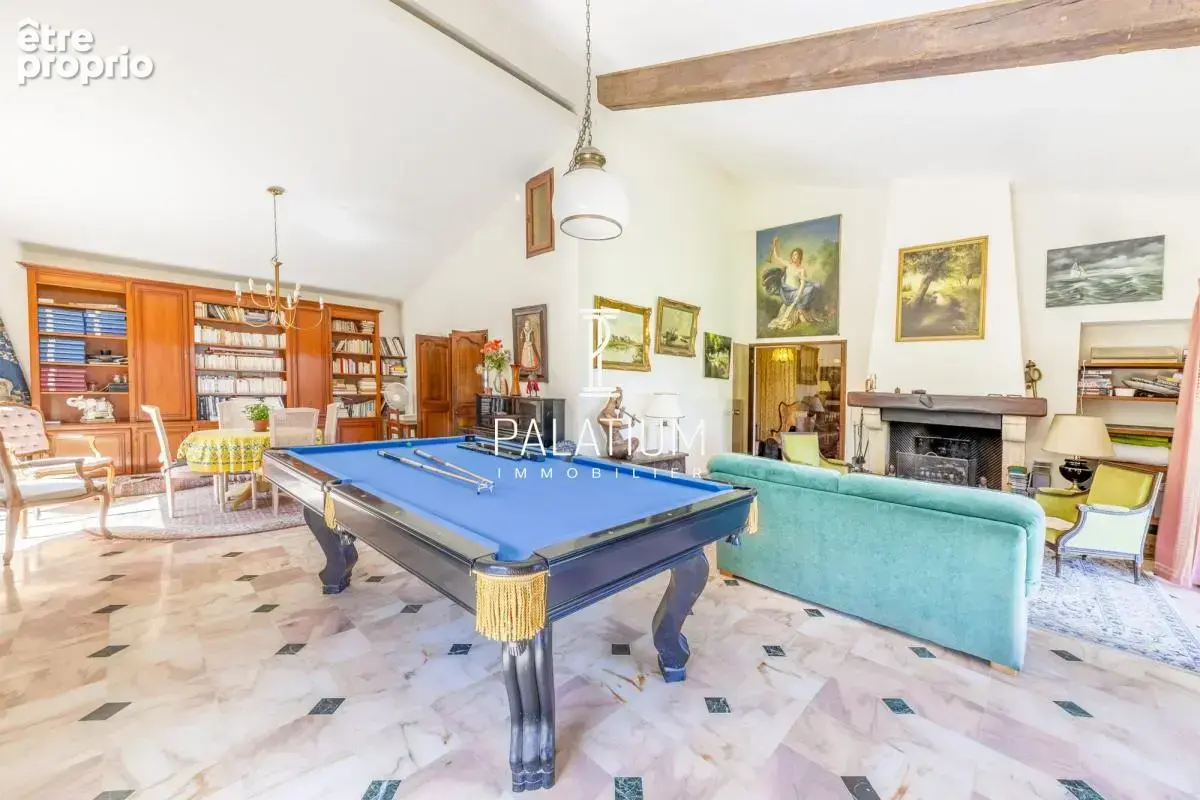 Maison de plain-pied avec jardin arboré et 3 appartements - photo 6