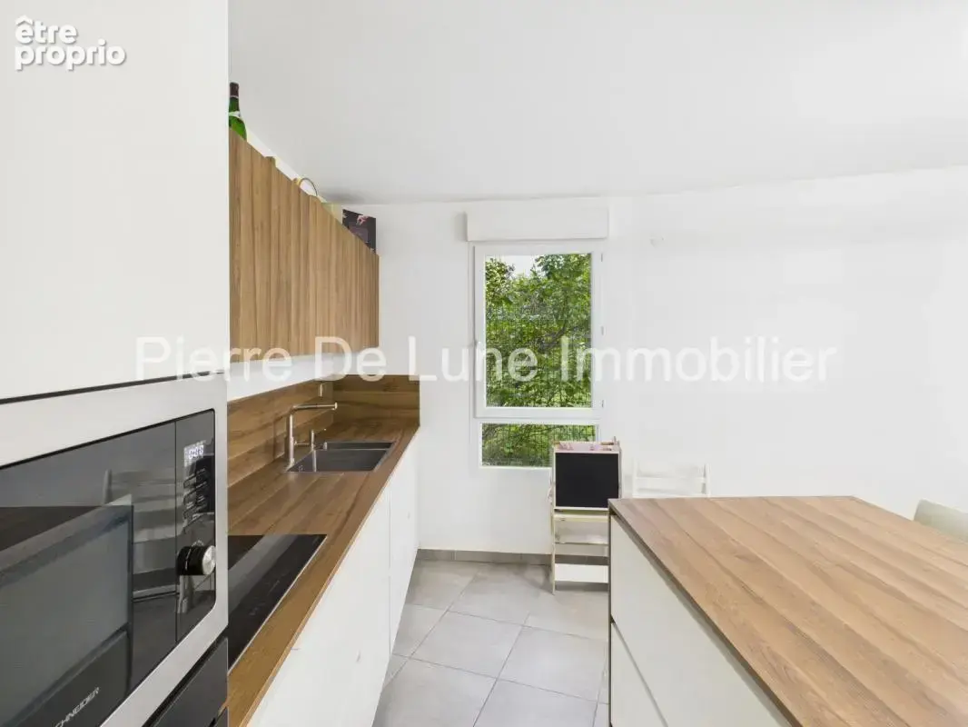 Appartement 4 pièces 113 m² à vendre à Sathonay-Camp (69580) - photo 2