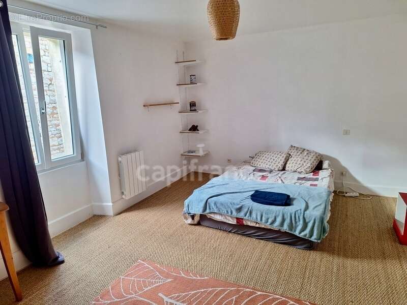 Maison à vendre en pierre 5 pièces, rénovée avec charme en plein cœur de Puylaroque (82) - photo 5