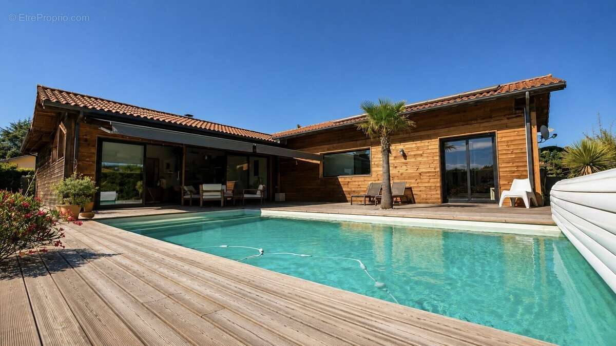 À 2 km de Dax, villa d'architecte T6 de plain-pied avec piscine et 5 chambres. - photo 25