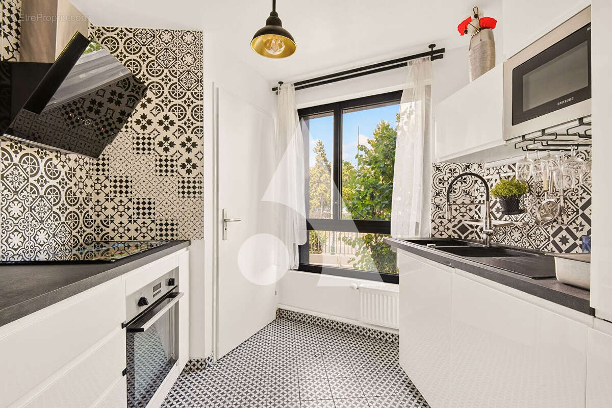 Appartement familial récent 86,9 m² - Métro Gabriel Péri Gennevilliers - Proche Clichy - Proche Asnieres sur seine - Box en sus - photo 4