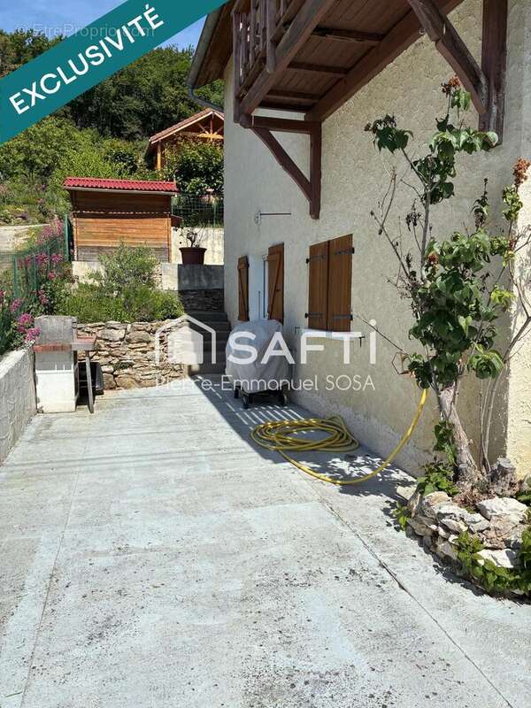 Maison 90 m² à Belmont-Luthezieu  - photo 2