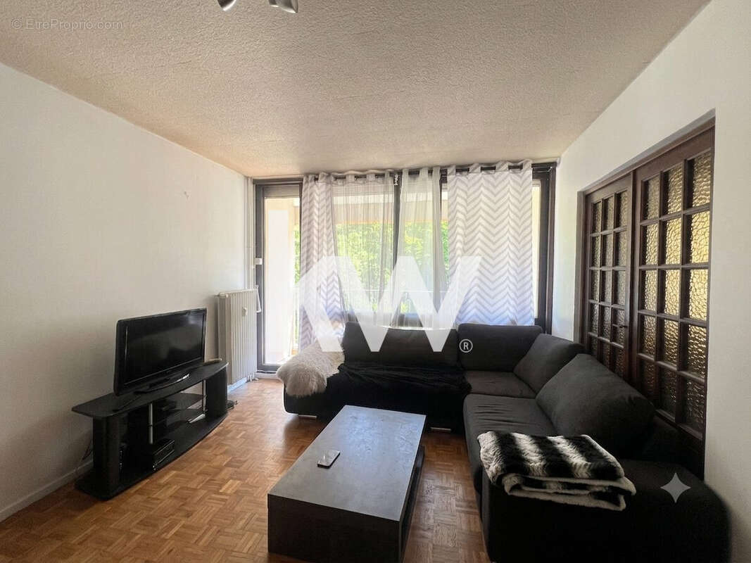 Appartement 66 m² à Saint-Etienne  - photo 4