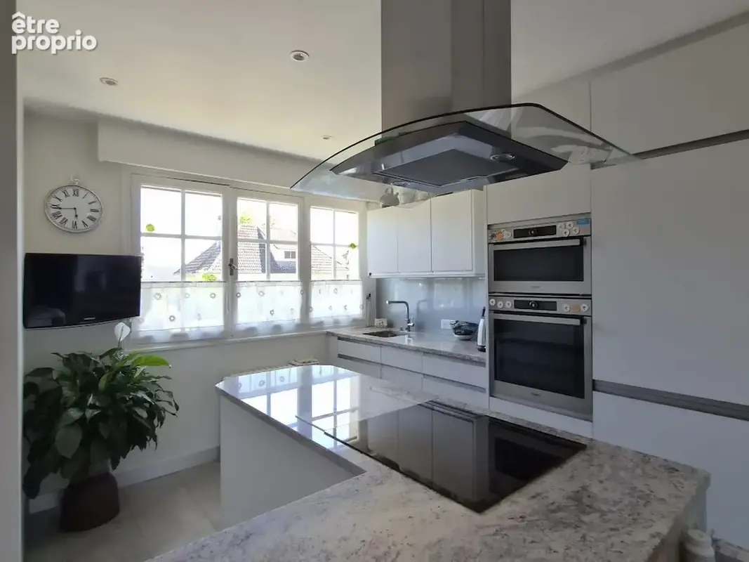 Maison 6 pièces 125 m² à vendre à Amilly (45200) - photo 6