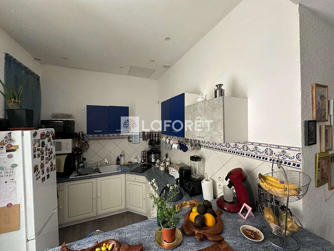 Perpignan - Quartier prisé ! Superbe F2 bis en rez-de-jardin de plus de 80 m², vendu loué ! - photo 4