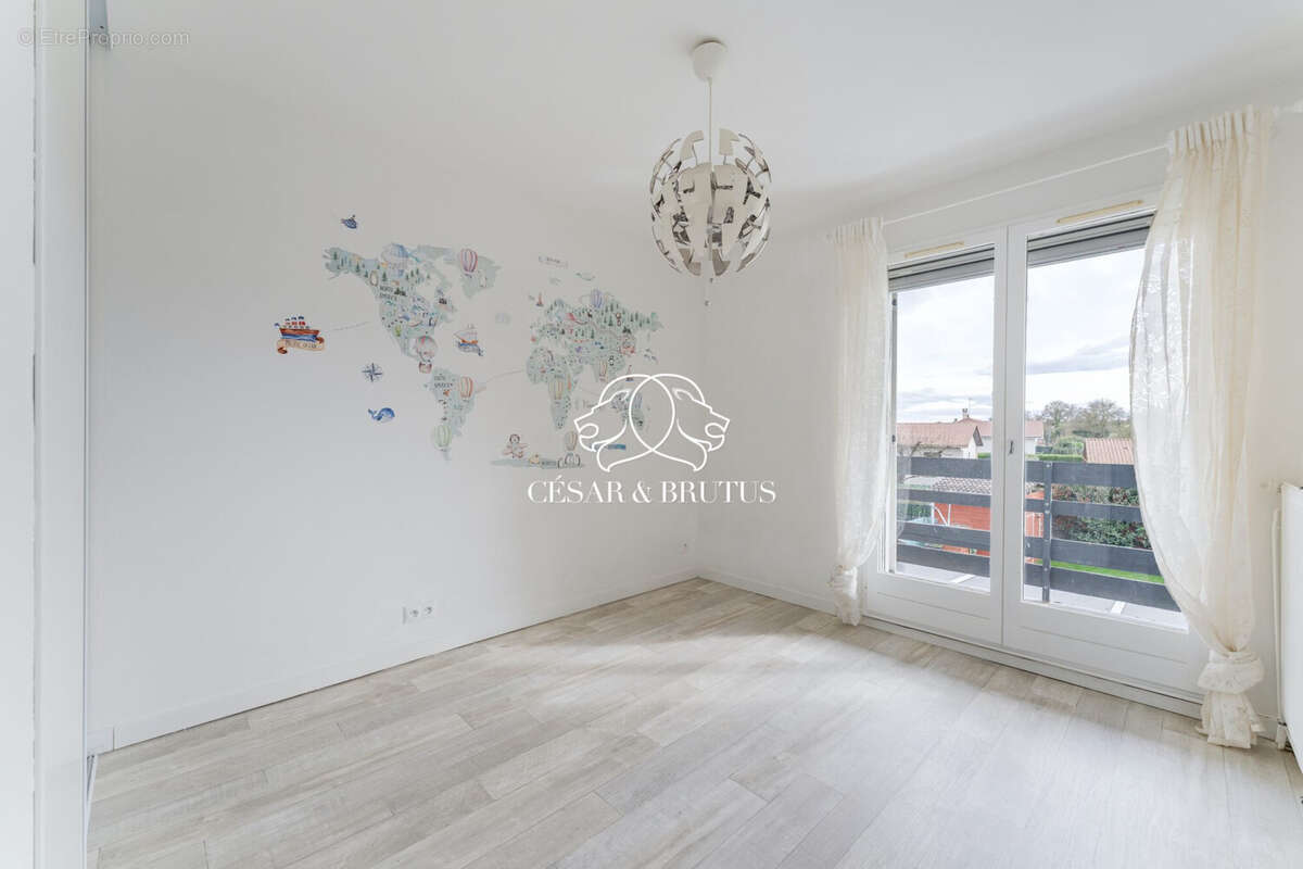 Maison 128 m² à Charvieu-Chavagneux  - photo 9