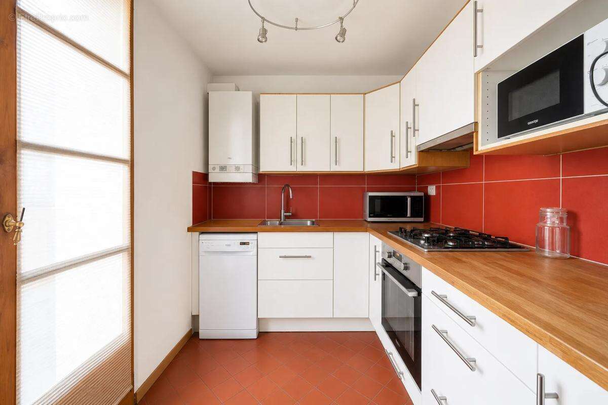 Appartement 75m² avec terrasse  loué jusqu'en 2028 - photo 2