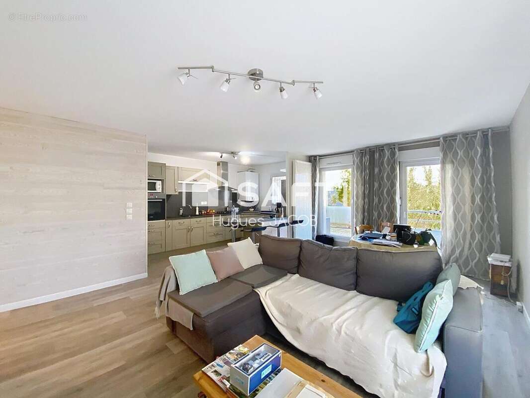 Photo 2 - Appartement à HEROUVILLE-SAINT-CLAIR