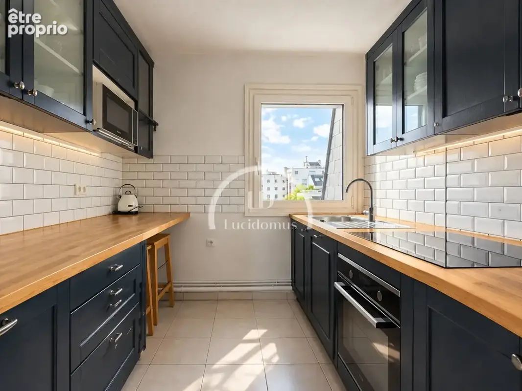 Appartement 4 pièces 72 m² à vendre à Paris-15e (75015) - photo 4