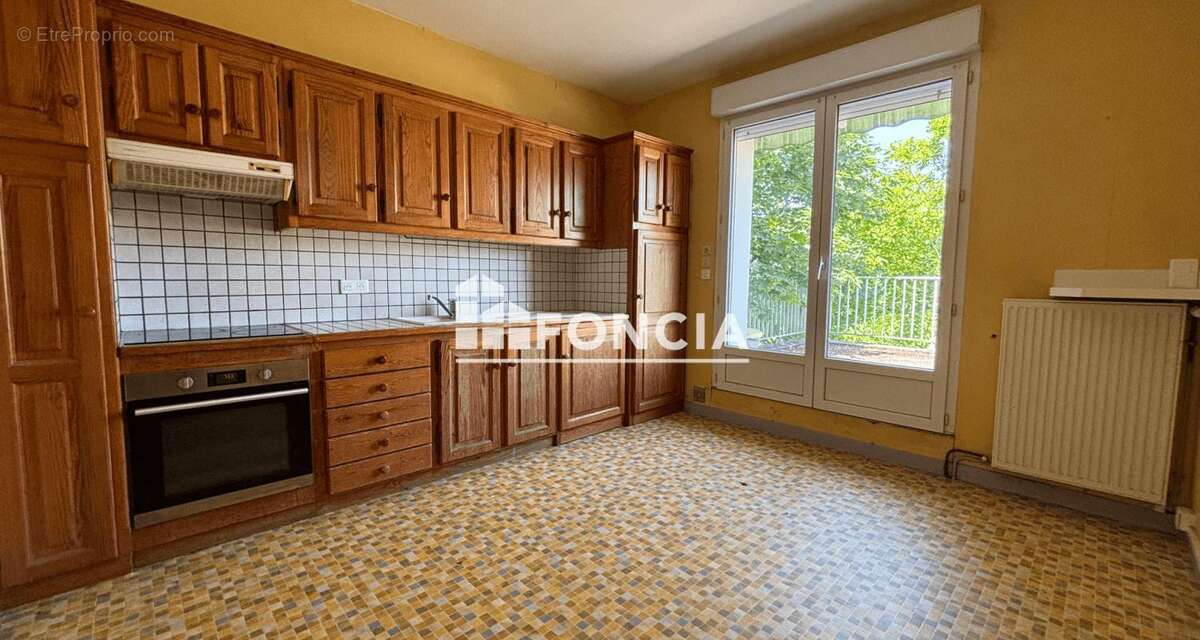 À vendre – Maison de 145 m² avec grande terrasse, garage et jardin à Villeneuve-sur-Lot - photo 6