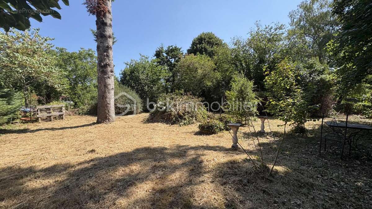Maison mitoyenne 70 m² avec jardin arboré de 706 m² - photo 10