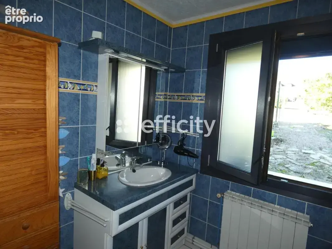 Maison 4 pièces 115 m² à vendre à Gannat (03800) - photo 7