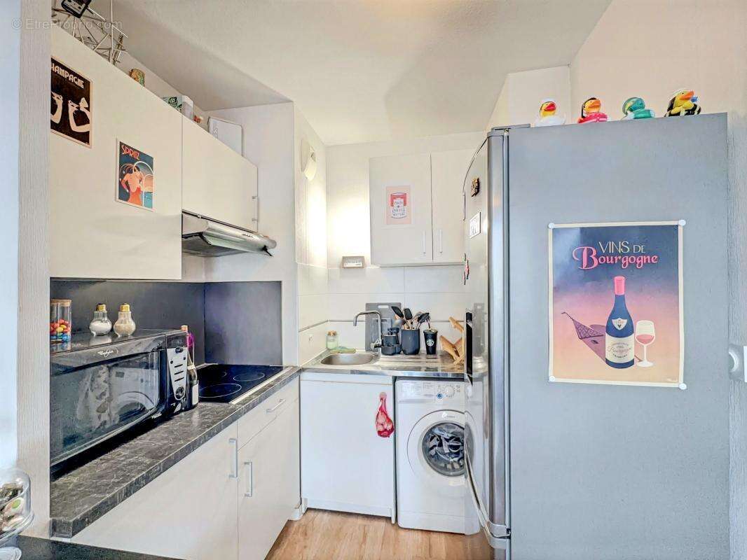 Appartement T2 idéal investisseur, bon DPE, balcon, place de parking exterieur - photo 4