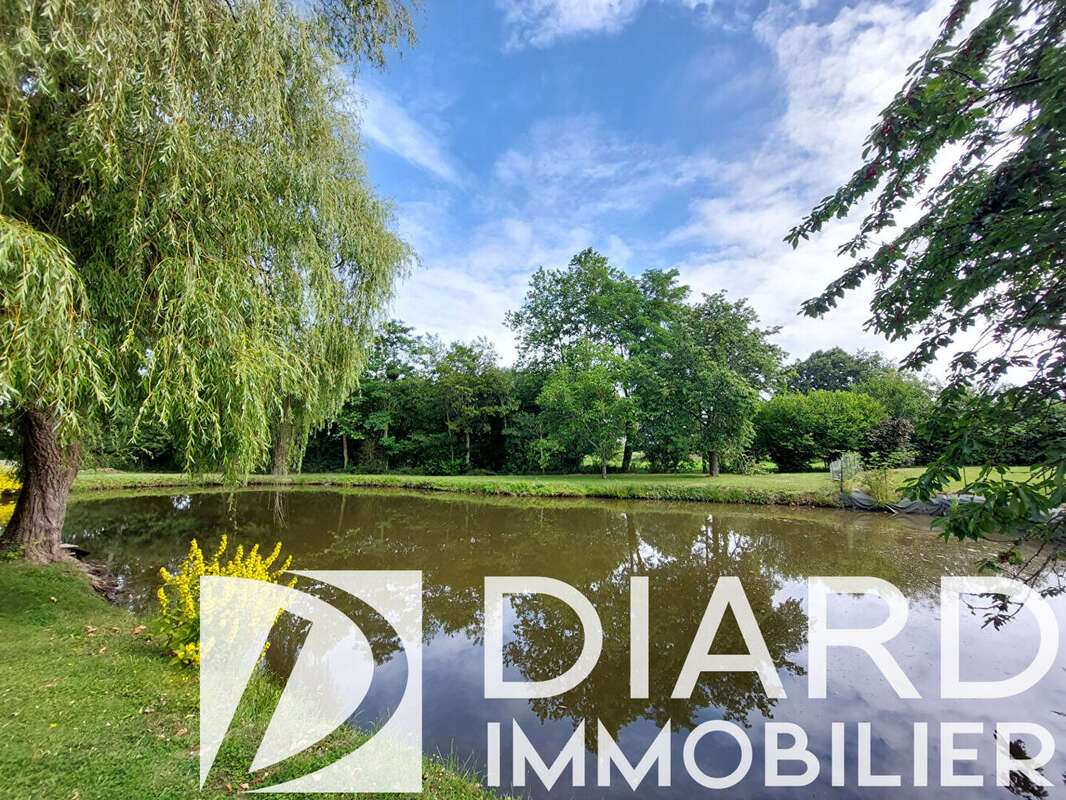 Propriété 201 m² , dépendances et plan d'eau - photo 14
