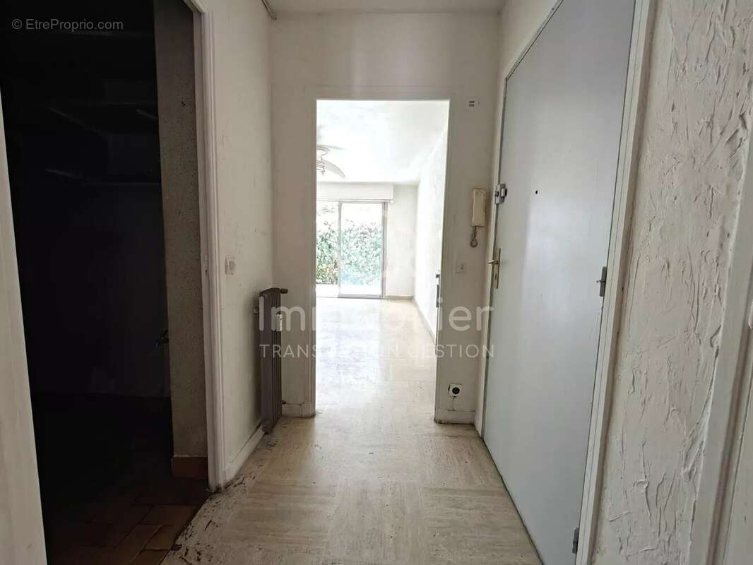 T3 traversant sud-nord 62m² rez-de-jardin - photo 12