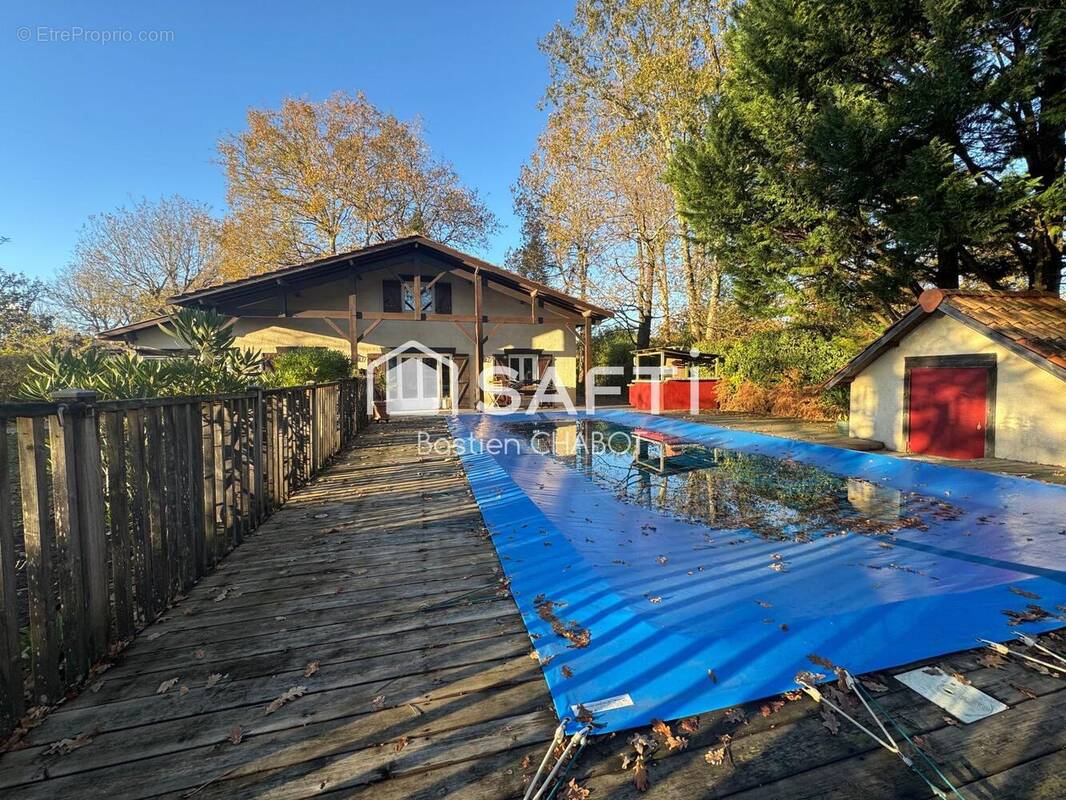 Photo 1 - Maison à SAINT-JEAN-D'ILLAC