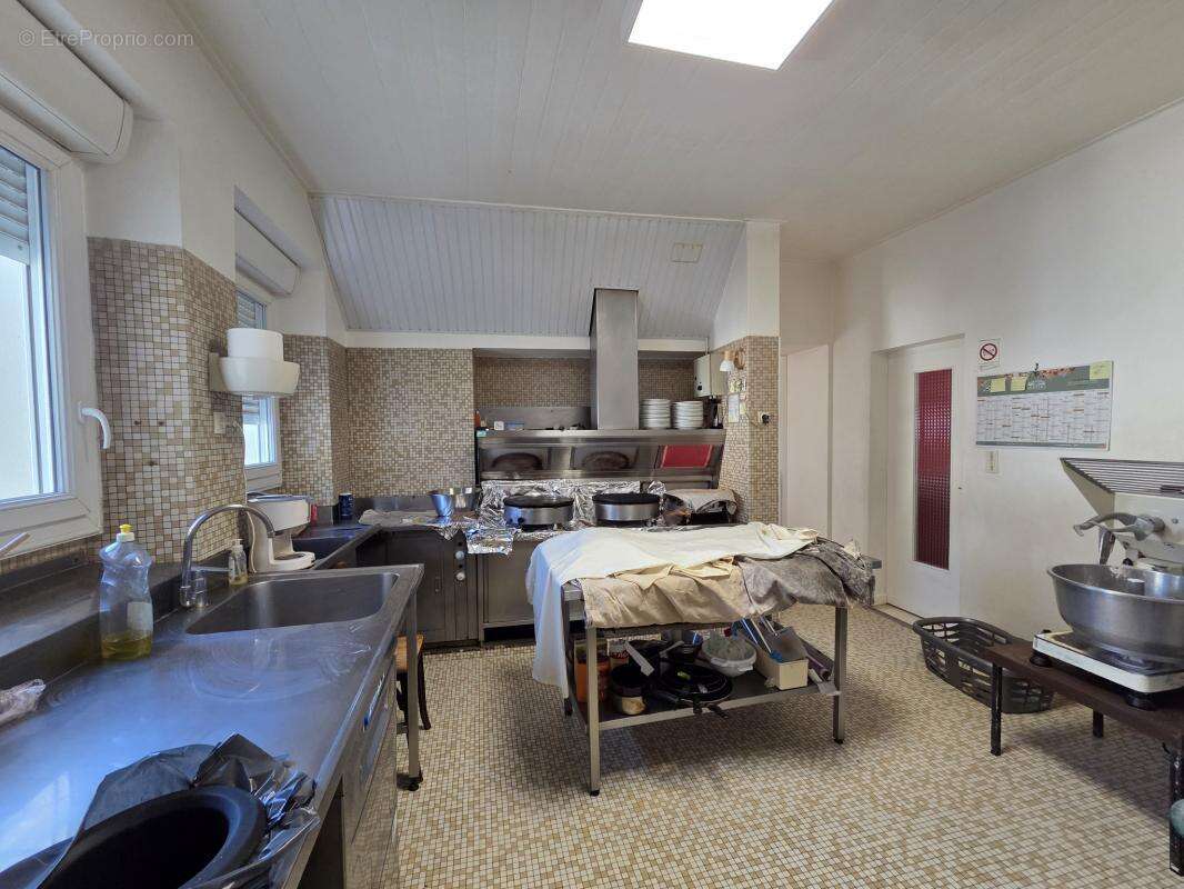 Ensemble immobilier 3 logements-parking- centre bourg neulli - photo 5