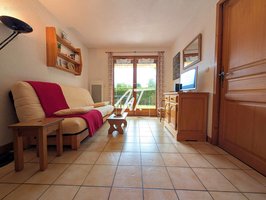 Appartement en rez de jardin à proximité du village - photo 2