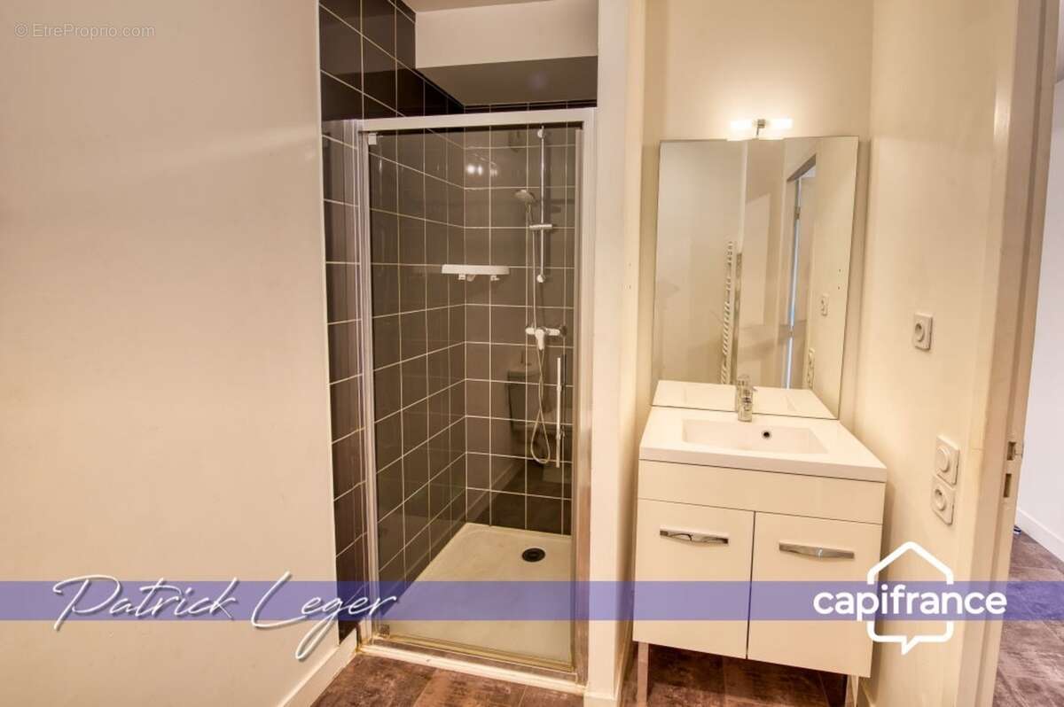 PÉRIGNY (17) – Élégant T3 modulable avec grande terrasse couverte & parking sous-sol - photo 8