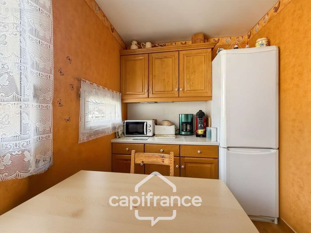 Duplex coup de coeur- l'espace d'une maison en appartement-2 caves et parking en sous sol - photo 8