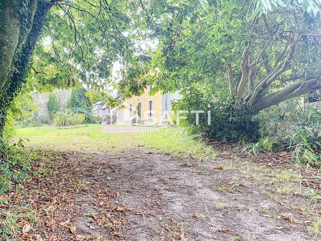 Photo 2 - Maison à PLUGUFFAN