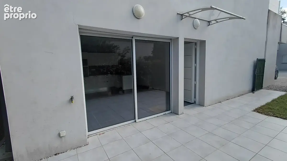Beau rez de jardin avec garage - photo 2