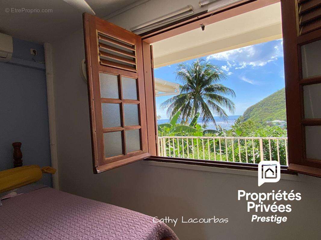 Rare ! Propriété à Deshaies avec grand jardin et vue mer - photo 6