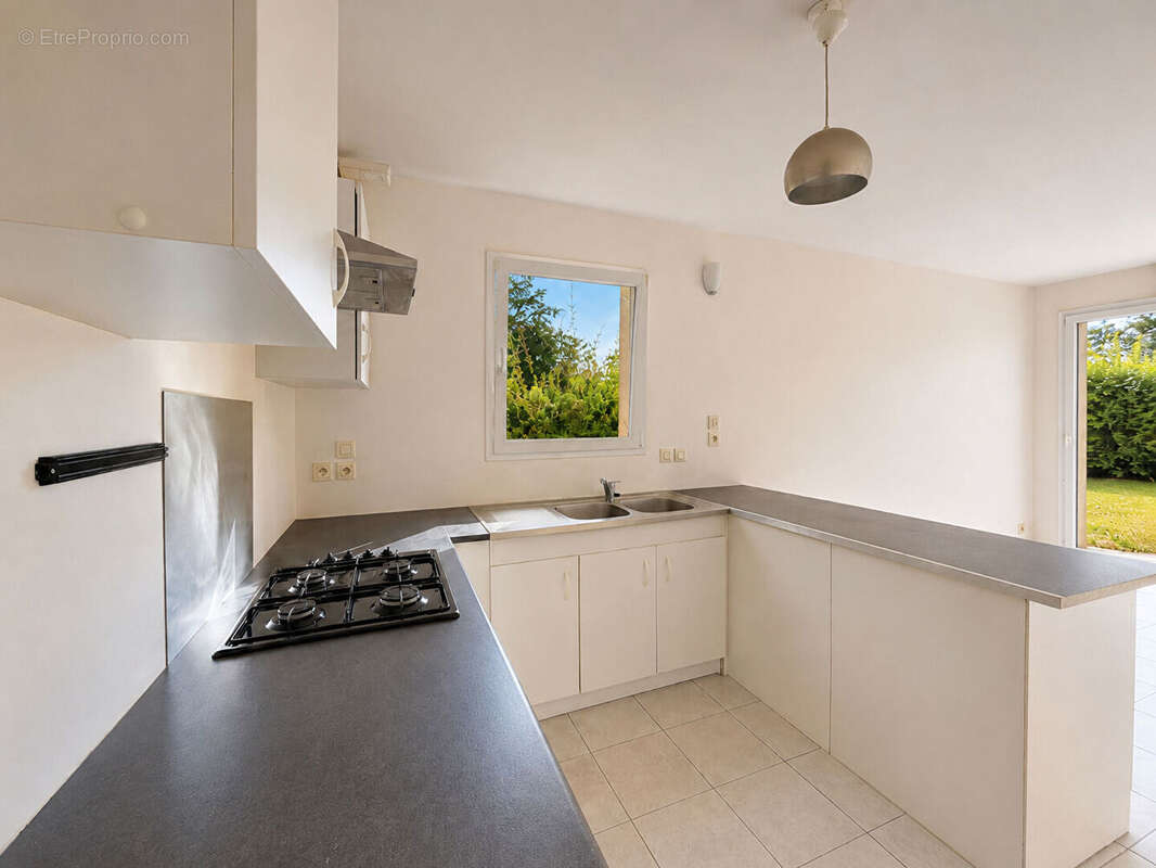 A vendre - Maison Plougonven 80 m2 4 pièces - photo 4