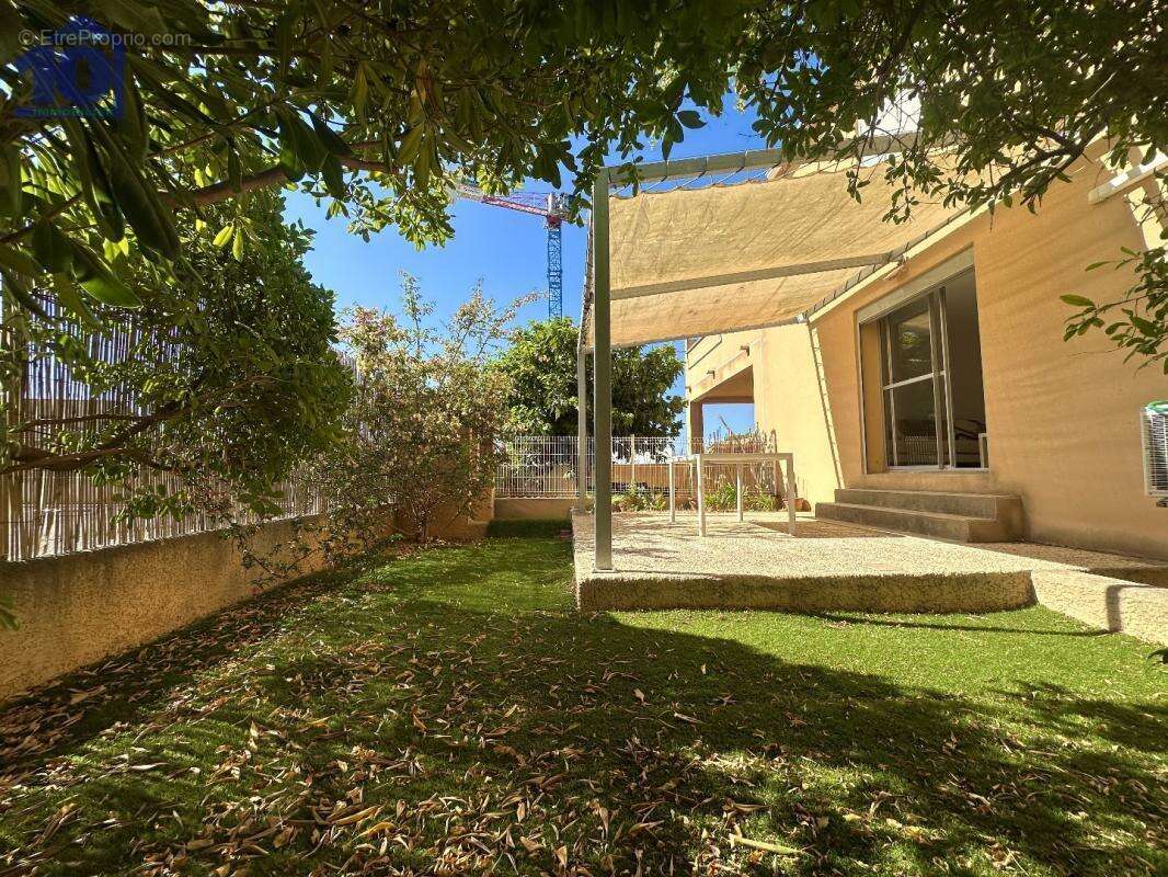 Appartement en rez-de-jardin - photo 4