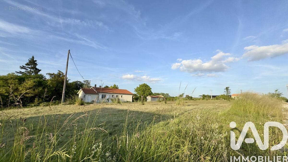 Photo 1 - Terrain à LEVIGNAC-DE-GUYENNE