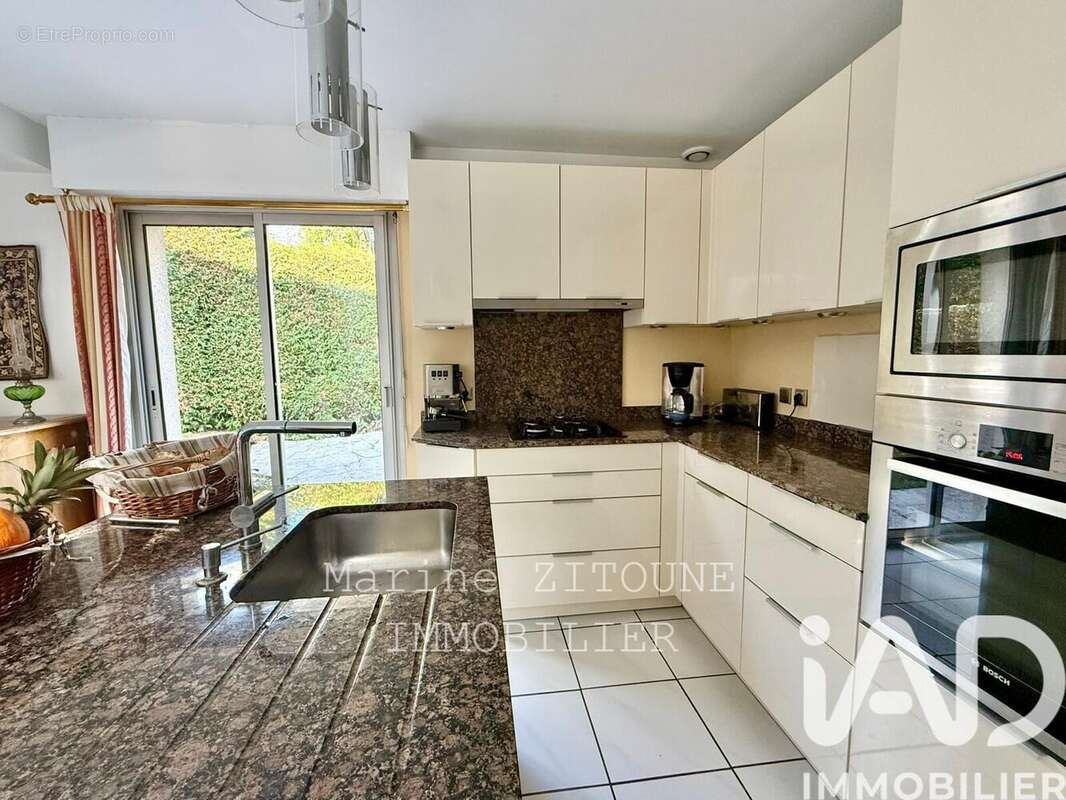 Maison 130 m² à La Ville-Du-Bois  - photo 6