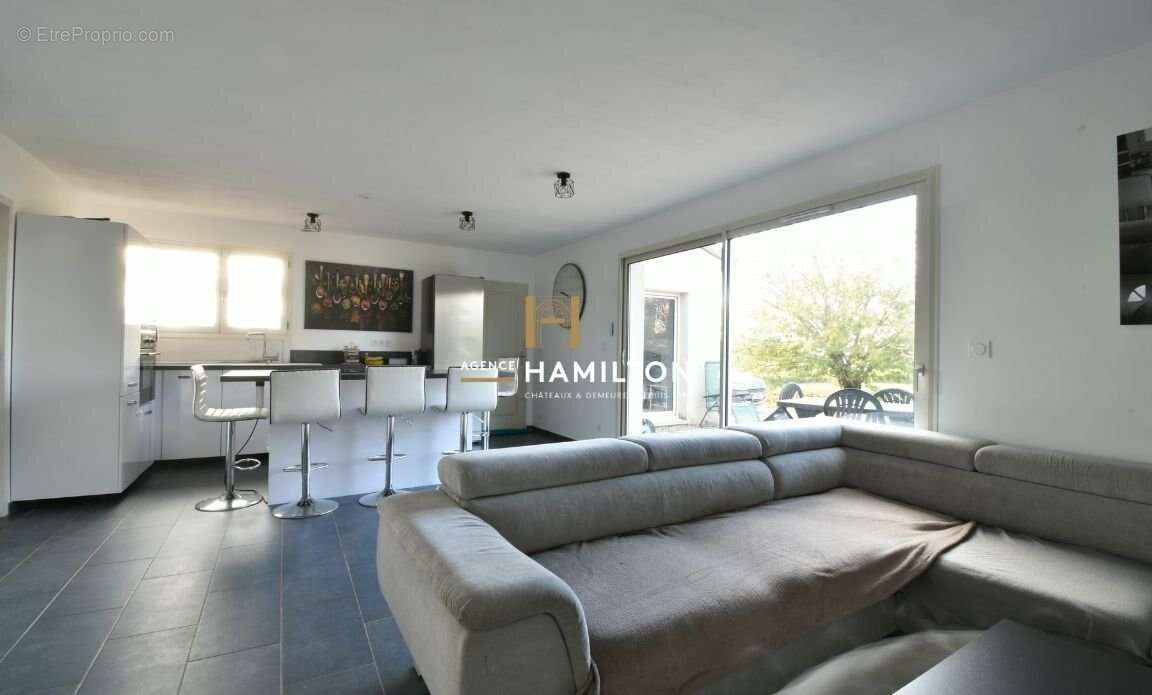 Maison moderne de plain-pied avec suite parentale et grand terrain - photo 11