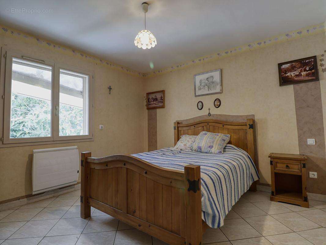 Maison de plain-pied de 110 m² - 3 chambres - Garage - Véranda -Terrain de 682 m² - photo 8