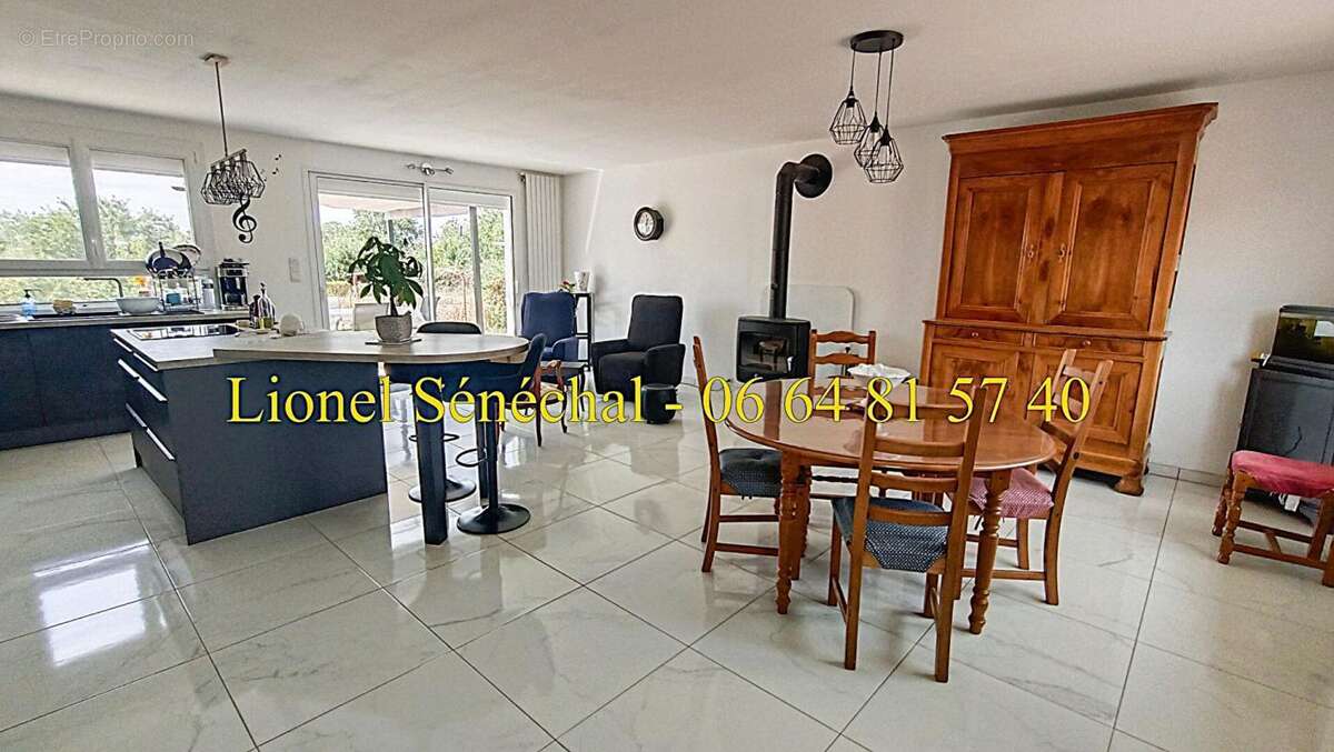 Maison entièrement de plain - pied rénovée, lumineuse et peu énergivore de 5 pièces de 90 m2 habitables - photo 3