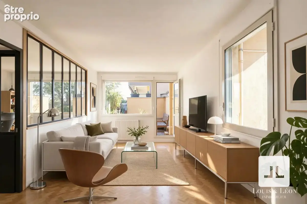 Appartement familial de 98 m² - balcon - cave & garage - photo 4