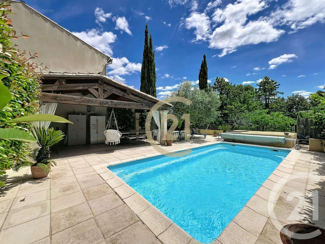 Maison à GARRIGUES-SAINTE-EULALIE