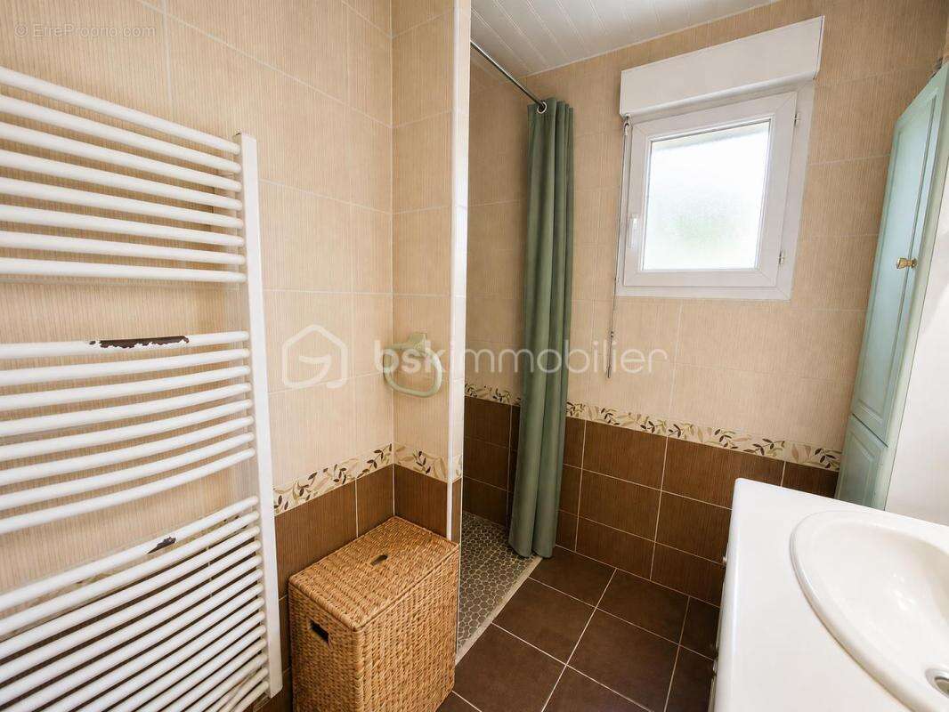  Maison familiale de plain-pied avec sous-sol complet  - photo 7