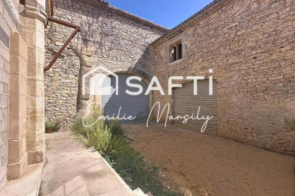 Photo 1 - Maison à LANGLADE