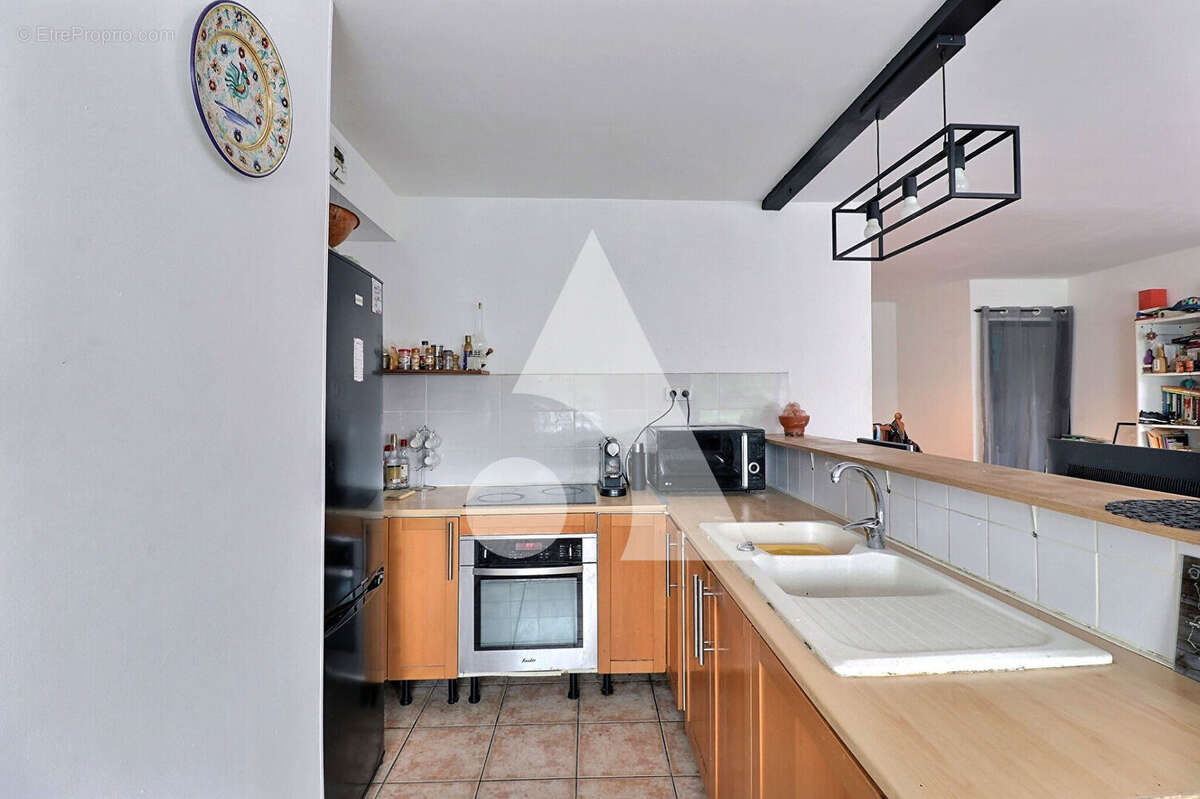 Appartement F3 en duplex avec extérieur - photo 3