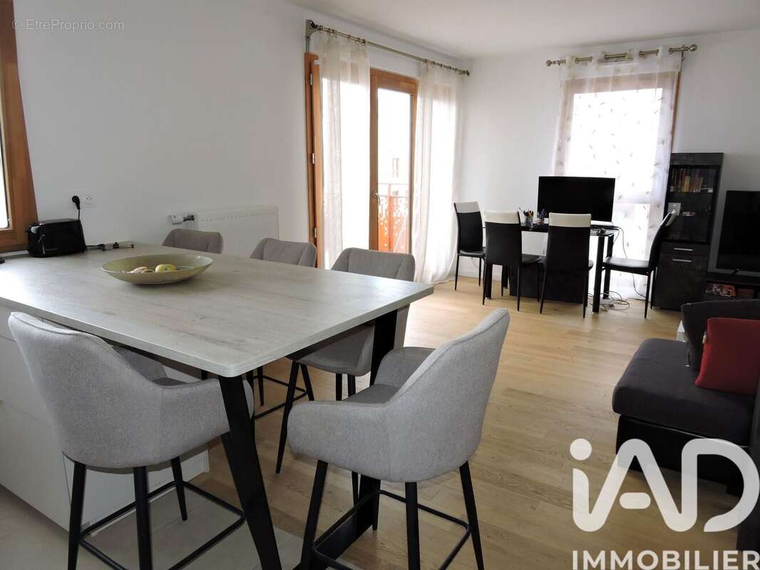 Photo 3 - Appartement à VOISINS-LE-BRETONNEUX