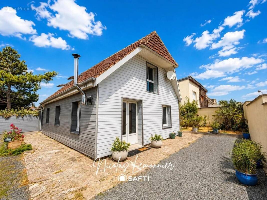 Photo 1 - Maison à COLLEVILLE-MONTGOMERY