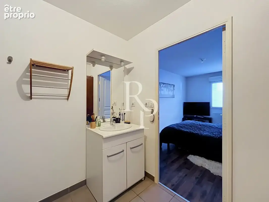 Appartement T2 de 49 m2 avec véranda et stationnement privatif   Hyper-centre - photo 4
