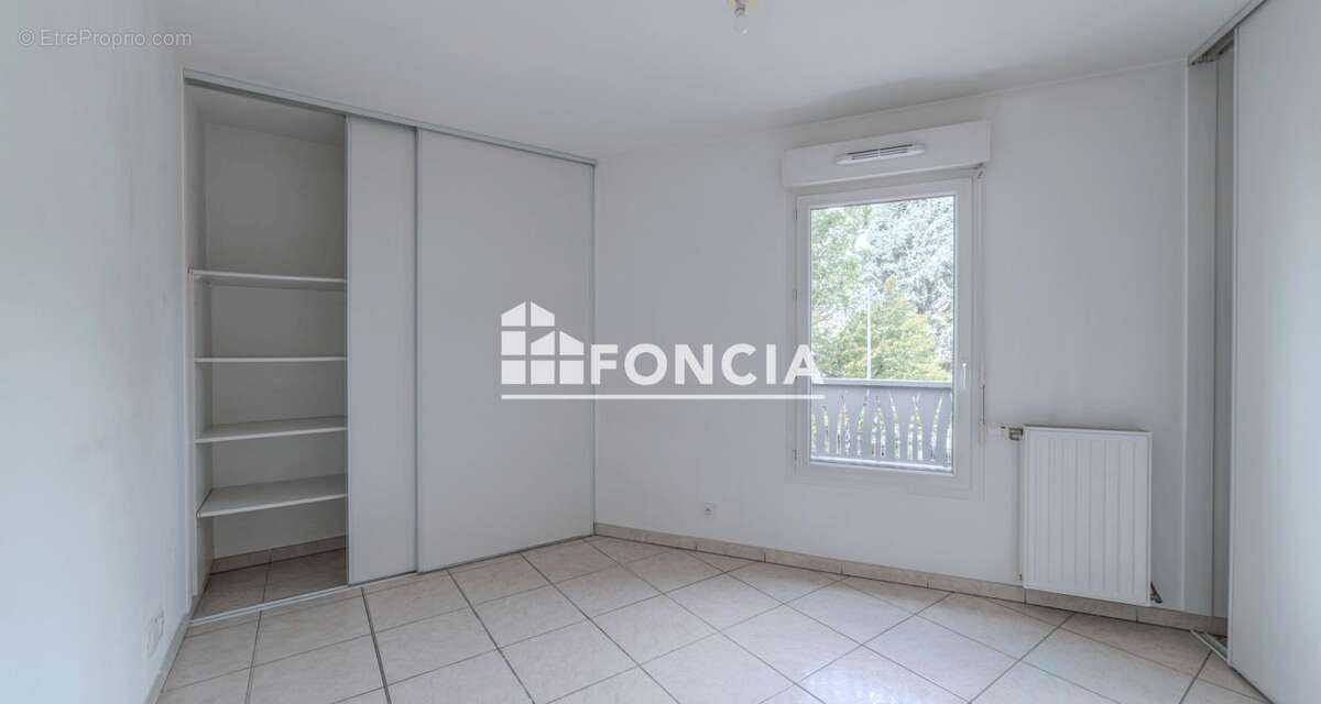 À vendre appartement T4 lumineux avec balcon et garage box – Proche centre de Neuville-sur-Saône - photo 8