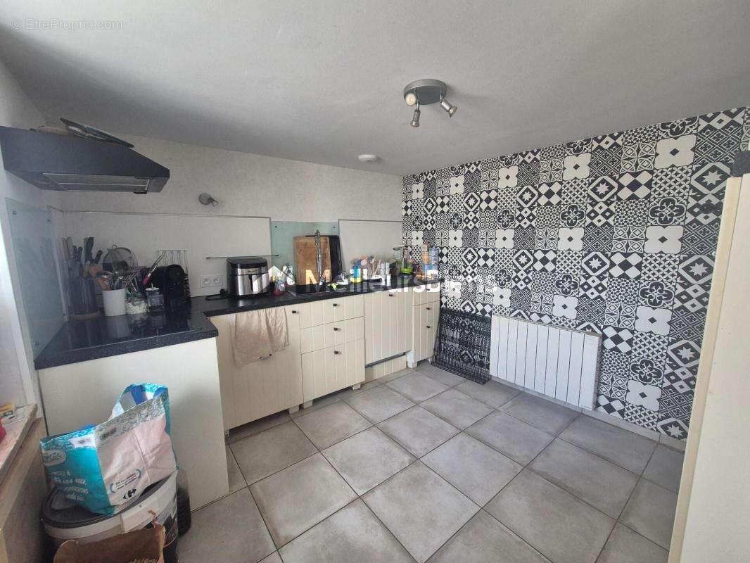Maison de 80m² centre bourg Taule - photo 4