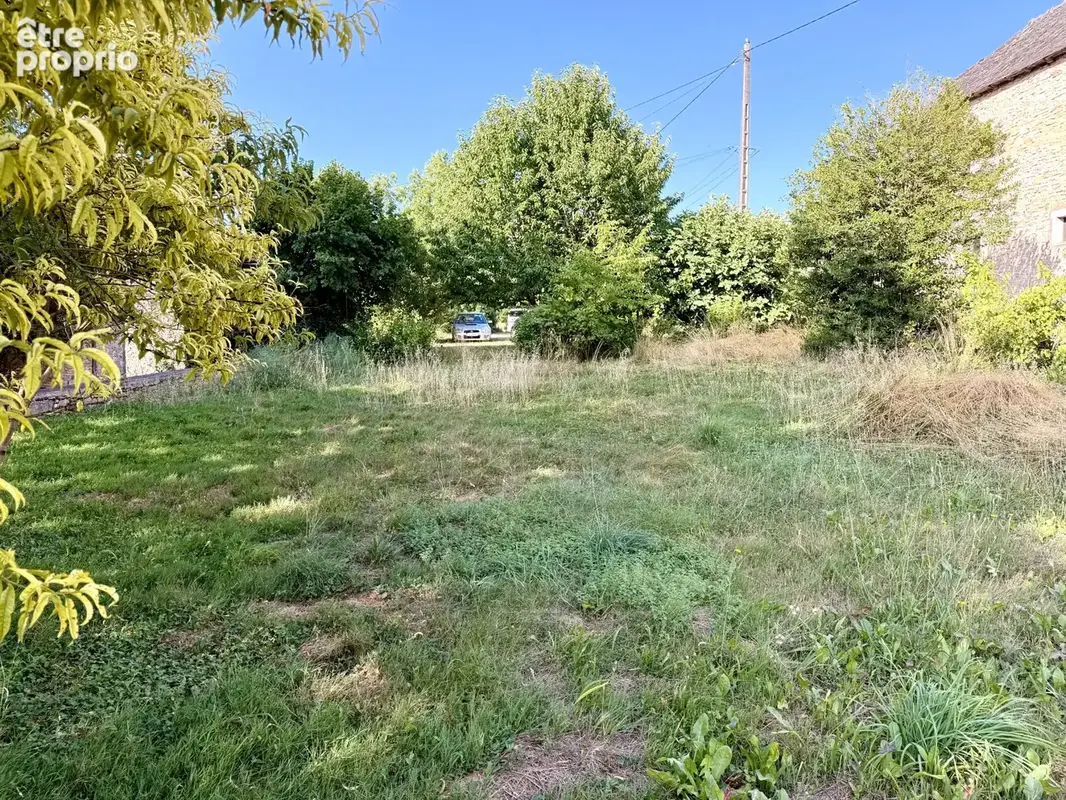 Maison de bourg en pierre avec terrain et dépendances - photo 5