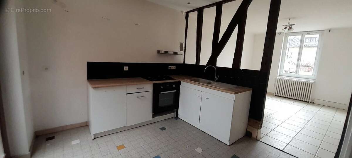 Maison de centre ville a mesnils sur iton - photo 2