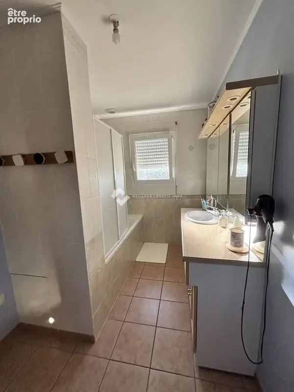 Maison 9 pièces 159 m² à vendre à Neuville-De-Poitou (86170) - photo 6