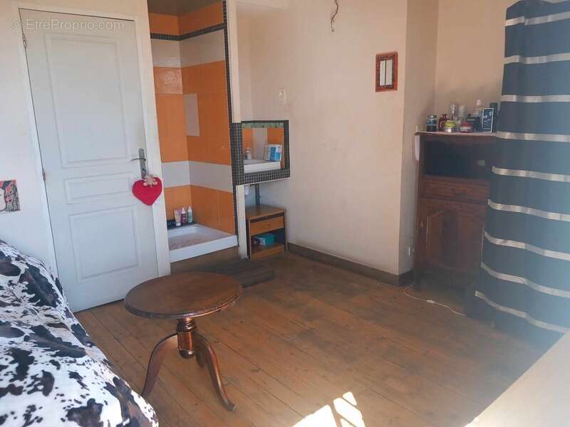 Maison de ville 88 m² avec garage, grenier aménageable et fort potentiel d'investissement – Quartier du Moutier à Thiers - photo 9