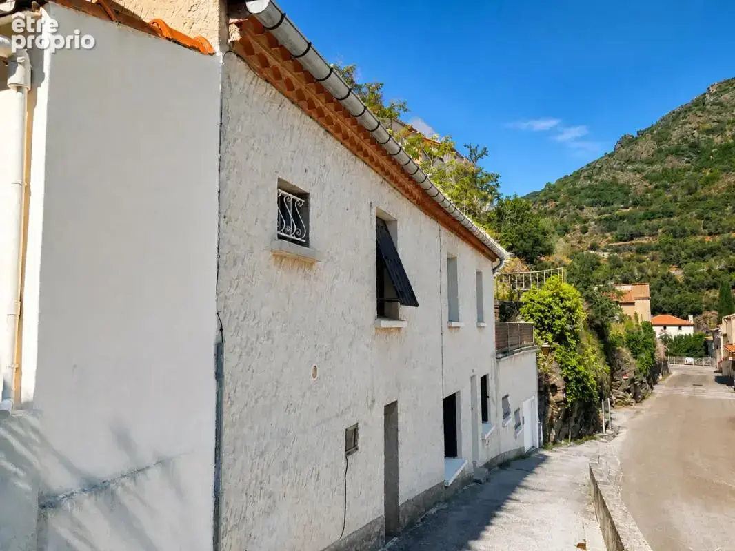 Maison de 5 pièces de 126 m² à Lastours avec terrasse et jardinet.
Vue panoramique - photo 12