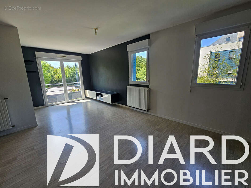 Appartement 3 pièces à vendre à Vitré - 65 m², 1er étage, bon état - photo 2